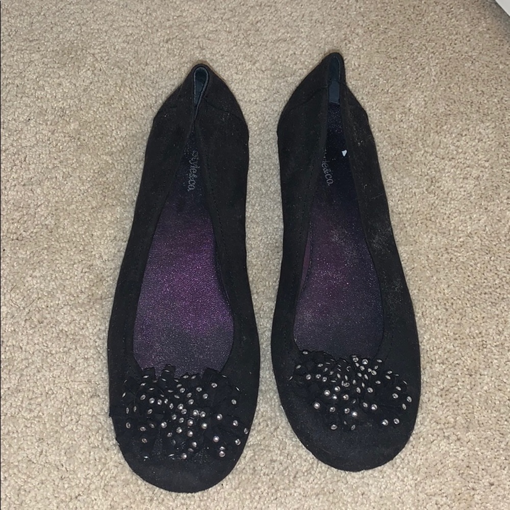 Black flats with stud design on tie